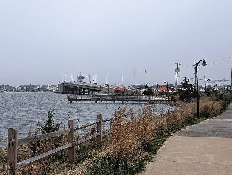 The Mantoloking Bridge and fishing pier seen from Mantoloking Bridge County Park in Brick