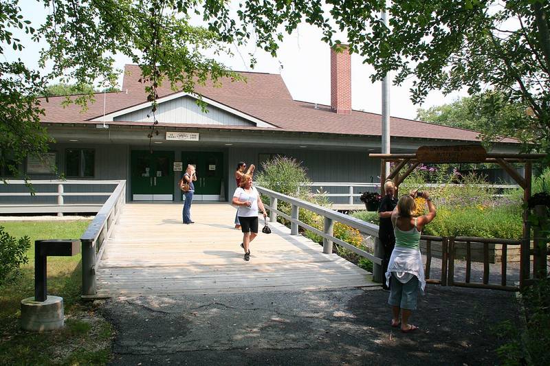 Visitors at the entrance of the Cooper Environmental Center in Cattus Island County Park
