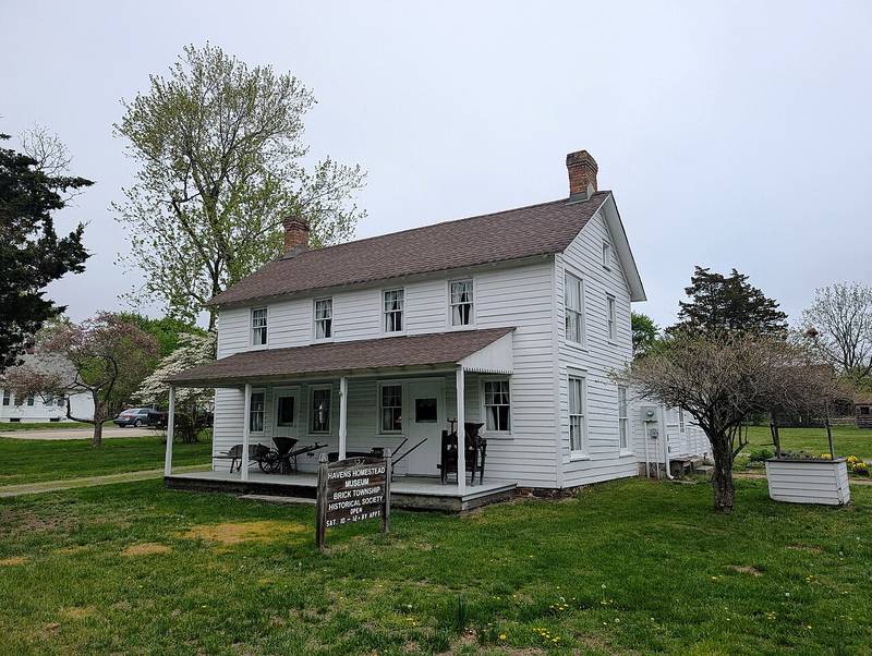 The white farmhouse of the Havens Homestead Museum in Brick Township