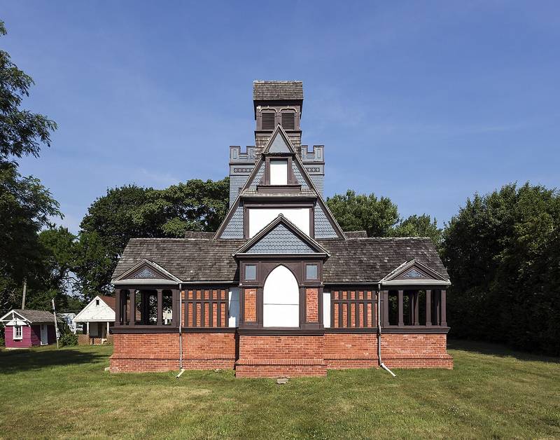 The Church of the Presidents in Long Branch, with the red Garfield Tea House behind it