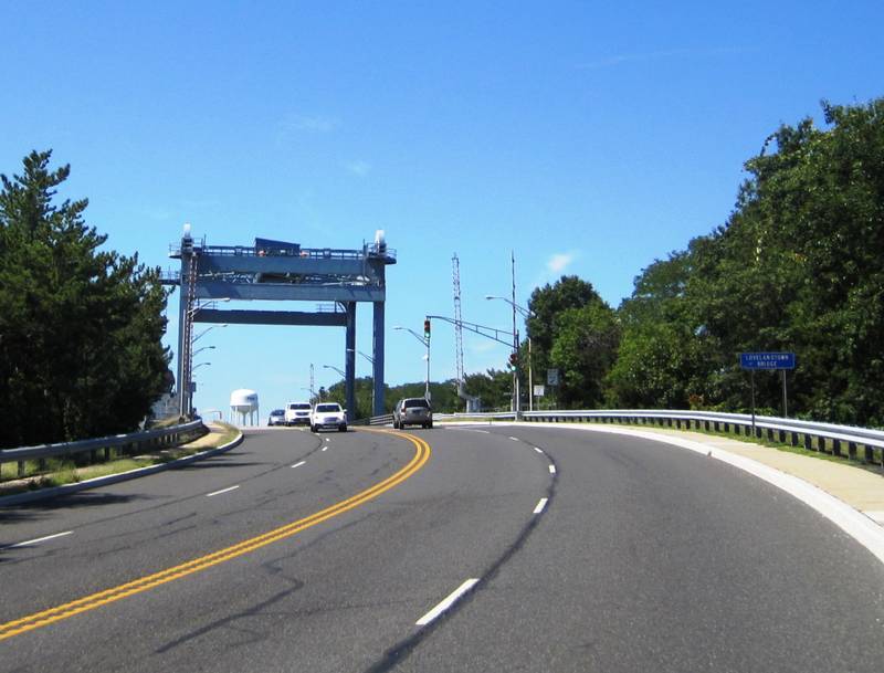 The blue lift towers of the Lovelandtown Bridge over the Point Pleasant Canal on Bridge Avenue