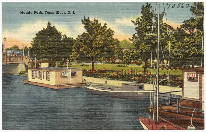 Vintage postcard of boats docked along Huddy Park on the Toms River