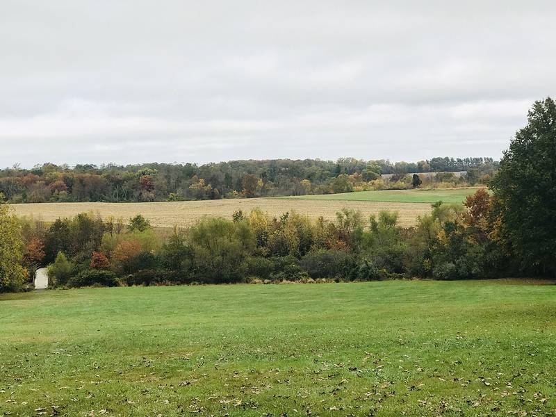 Rolling farm fields and autumn woods in Manalapan, New Jersey